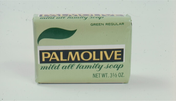 Soap bar with green packaging labeled Palmolive Mild All Family Soap from 1898.